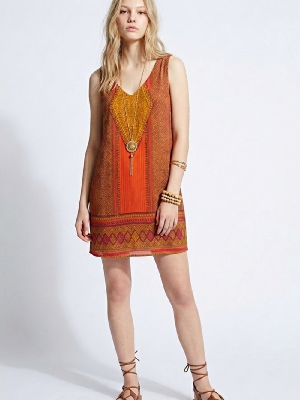 City Triangles Orange and Yellow Patterned Tunic dress, with attached necklace.